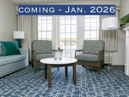 A living room with chairs, a sofa, and a table. A "Coming - Jan. 2026" banner is displayed above the window in the image.